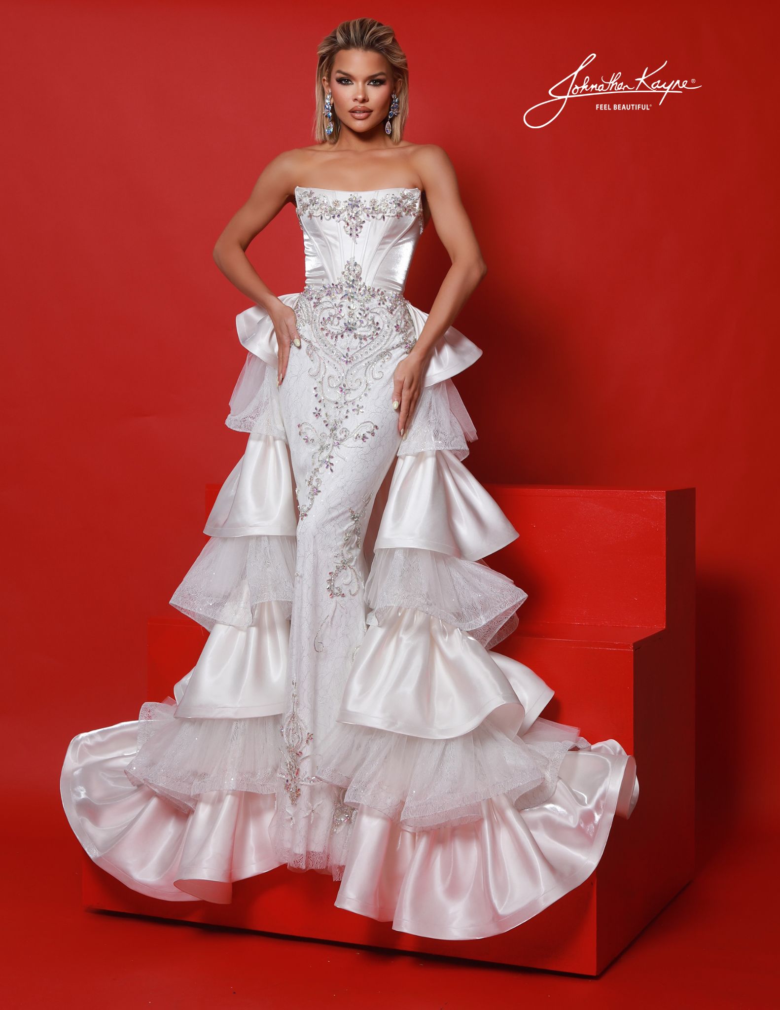 White strapless ruffle gown with embroidered bodice and layered shimmer satin overskirt - ideal for pageant, evening wear, homecoming court, and bridal.
